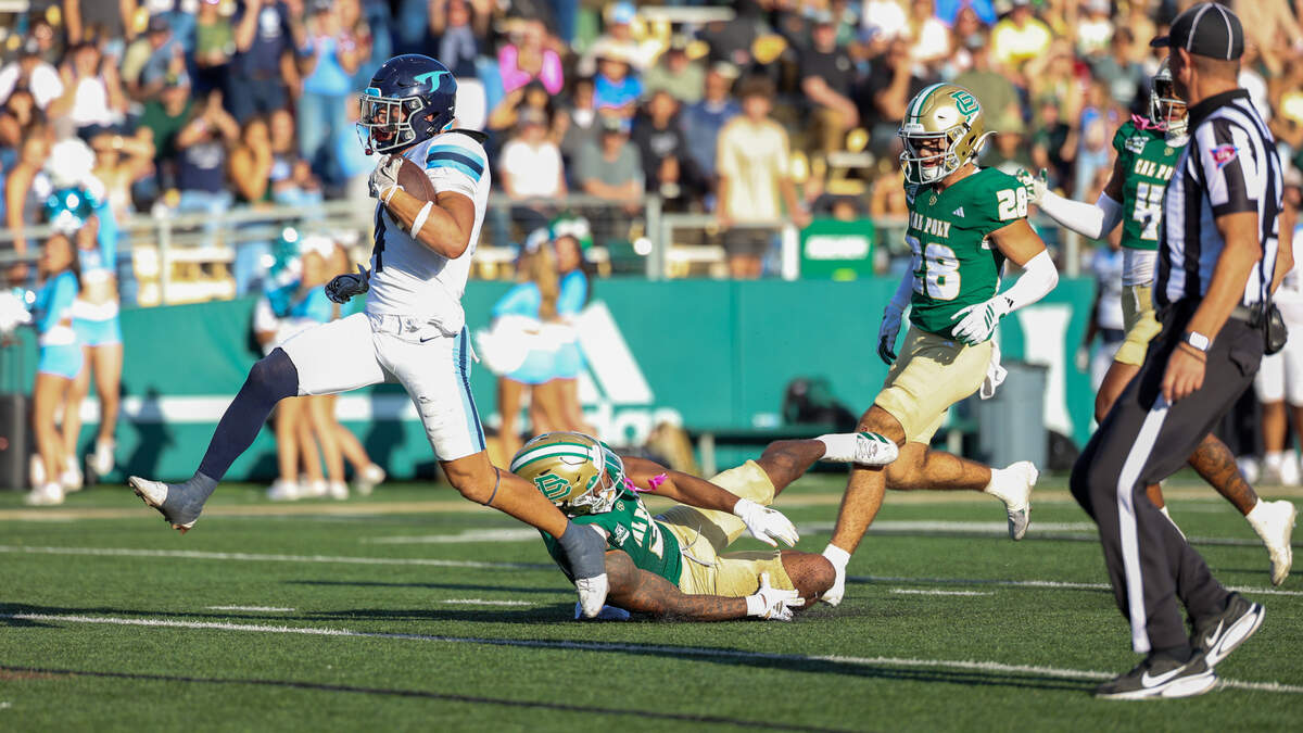 University of San Diego running back Adam Criter rushes for a touchdown in the first quarter at Mustang Memorial Field on Sept. 19, 2026. The Mustangs lost to the Toreros 38-35 on Homecoming night on a last-minute field goal.